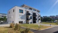 See- und Bergsicht Exklusives 1,5 Zimmer-Appartement in FN-Windhag - Aussenansicht